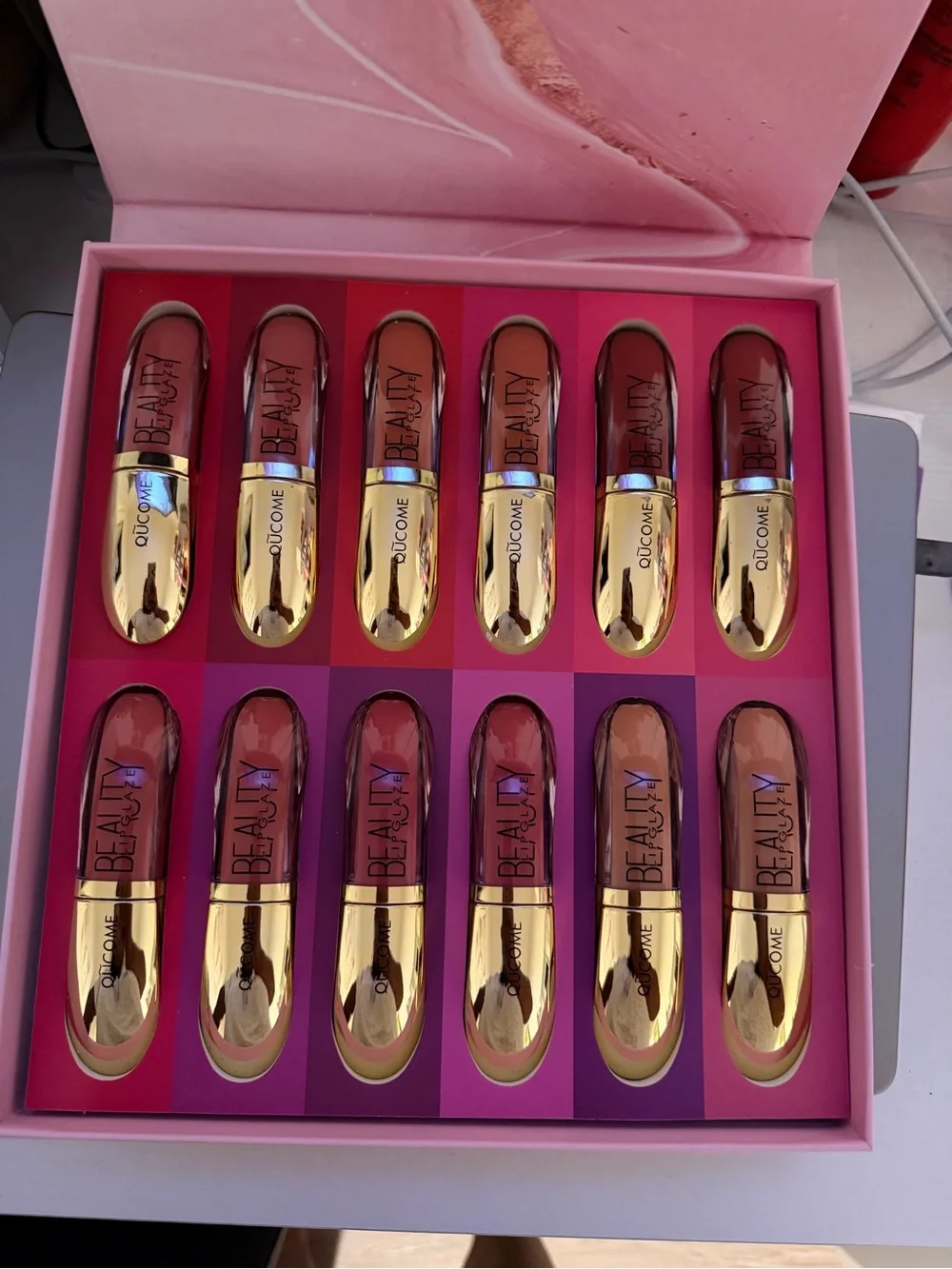 Gold-Accented Pink & Nude Lip Gloss Set - 12 Shades